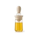 Una aceitera con brocha