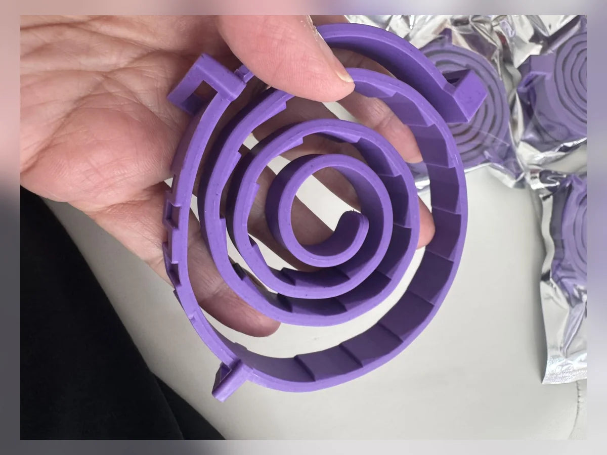 Fotografía de detalle del collar morado compartida con la reseña de Marcela P.